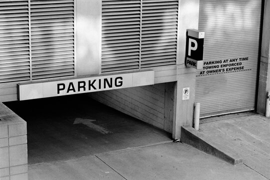 Reflected light patterns over a parking garage