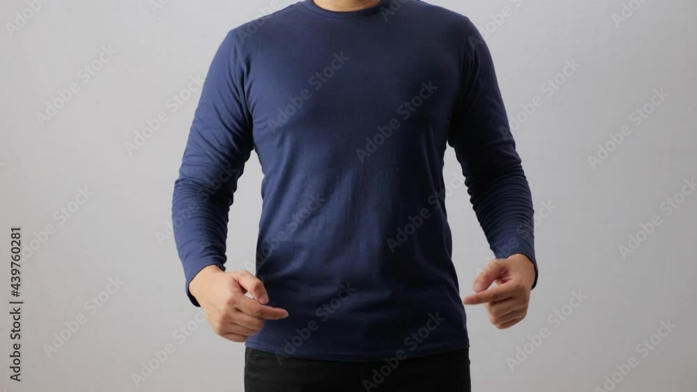 Wall mural Blank long sleeved shirt mock up template, front view, Asian man wear plain dark navy blue t-shirt isolated on white. Tee design mockup presentation