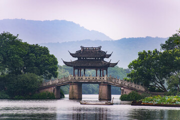  a very famous pavilion bridge-yu dai qiao (jade belt) - in west lake, hangzhou, china was built in...
