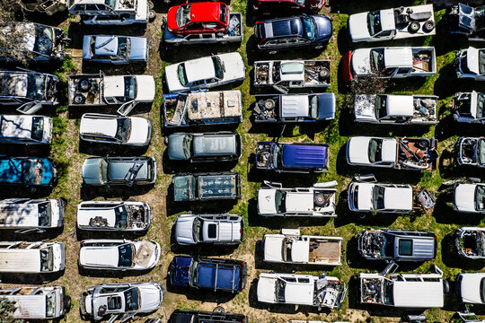 Aerial view of damaged car bodies at an auto wreckers