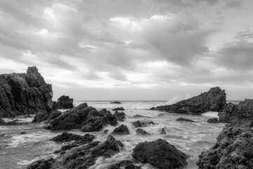 Monochrome photo of Leo Carrillo Beach at sunrise.