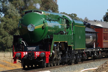 Fototapeta na wymiar Locomotive #3801 - steam train, historical train leaving Albury, NSW, Australia.