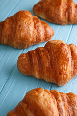 croissants on blue background