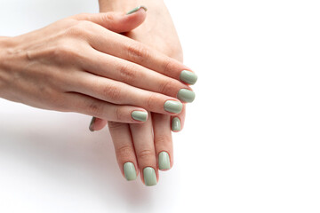 Beautiful womans hands with summer nail. Fresh manicure isolated on white background