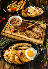 traditional dishes on the wooden background