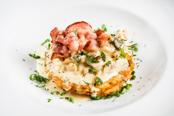 potato pancakes with bacon and sauce