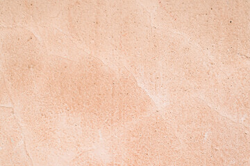 Faded old pink paint on the wall. Texture background, copy space