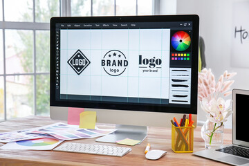 Comfortable workplace of graphic designer in office