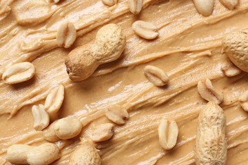 Fototapeta na wymiar Heap of tasty peanut butter, top view