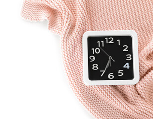 Stylish clock and fabric on white background