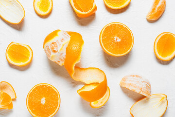 Fresh juicy oranges on light background