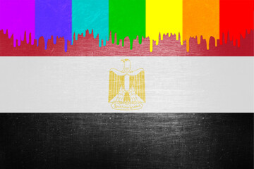 Paint (rainbow flag) is dripping over the national flag of Egypt