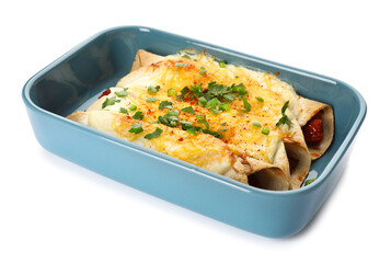 Baking dish with tasty cooked enchilada on white background