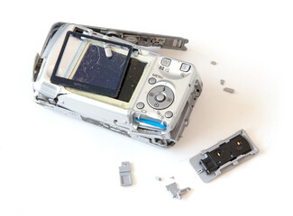 Broken old digital camera isolated, obsolete and not in use anymore