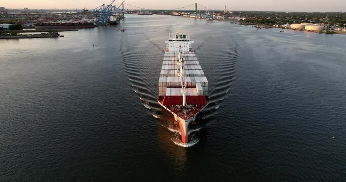 Aerial View of Cargo Ship Traveling Through the Water 
