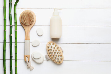 Set of spa supplies on white wooden background