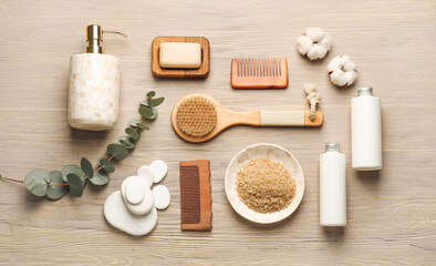 Fototapeta na wymiar Set of spa supplies on wooden background