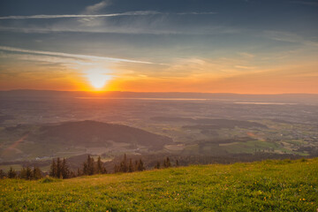 Naklejka na ściany i meble Sunset over the Swiss Alpes, shot from the 