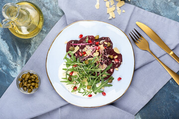 Composition with delicious beetroot carpaccio on color background