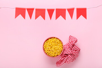 Corn and garland on color background. Festa Junina (June Festival) celebration