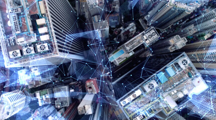 Aerial. Camera moving around buildings. Wireless communication network concept. IoT Internet of Things. ICTInformation Communication Technology.