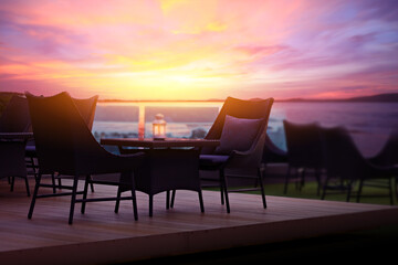 Chairs and tables at sunset.
