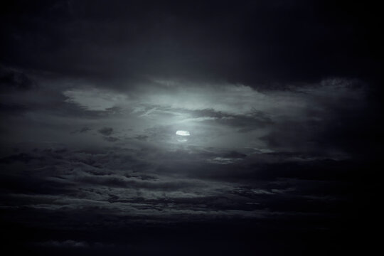 Cloudy full moon night