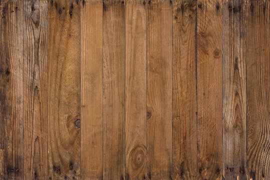 Wood background from old planks. Wooden texture of vintage weathered reclaimed barn wood, with rusty nails cracks and stains, sharp and detailed.