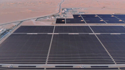 AERIAL. Top view of huge power plant and solar panel at UAE.