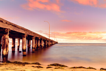 Obraz premium Sunset view near pier