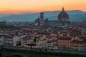Florence, Italy - 20 June, 2019 : twilight view of Cathedral of Santa Maria del Fiore, known for its red-tiled dome, view from Piazzale Michelangelo.