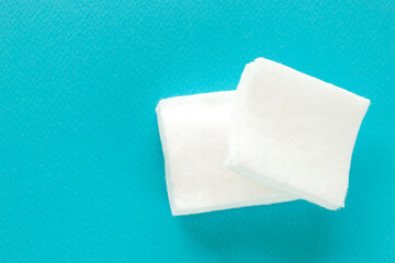 square cotton wool on blue background