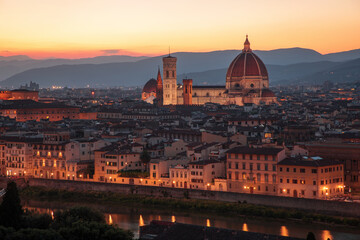 Florence, Italy -20 June, 2019 : sunset view of Cathedral of Santa Maria del Fiore, known for its red-tiled dome, view from Piazzale Michelangelo.