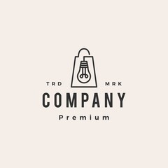 Fototapeta premium lamp bulb shop shopping bag hipster vintage logo vector icon illustration