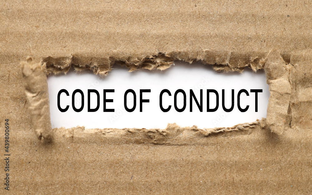 Poster code of conduct. text on torn cardboard. black letters on white paper