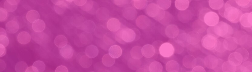 Silver bokeh effect on pink background