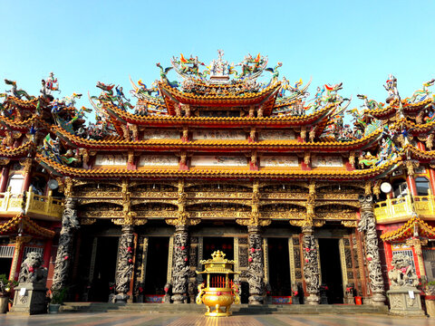 Temples in Taiwan. Believers come here to worship and become the center of faith. Dragon and Phoenix carvings and folk tales. A lot of gold paint shows nobleness