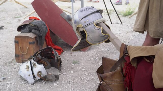 Military of ancient Rome. Roman legionary soldier metal equipment : Helmet and armor, Scutum shield, Gladius sword
