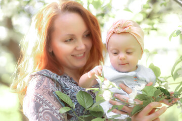Mom is always close up. Mother and daughter in nature.