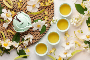 Herbal healthy tea with flowers of jasmine, linden and rosehips. Top view