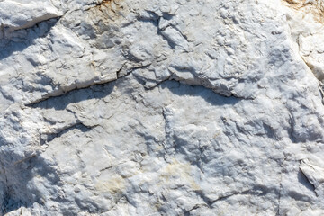 A fragment of a large marble block. Texture and pattern of natural blue marble. Stone background.