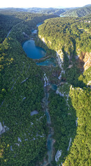 Aerial bird's eye view of “Plitvice” Lakes and waterfalls in HDR Croatia Europe National Park