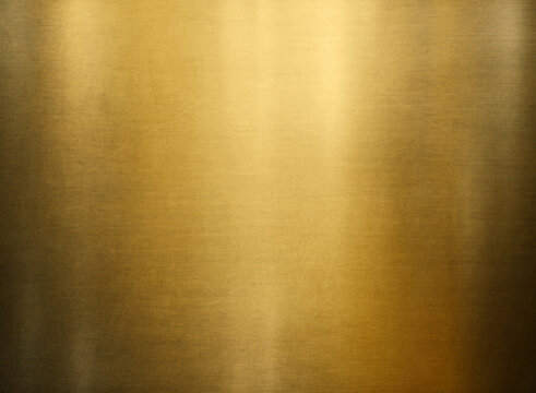 Gold metal texture with light reflection. Great background for design.