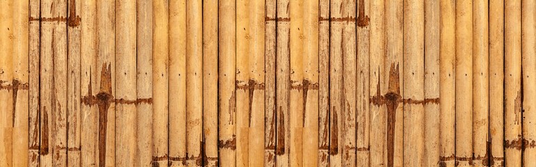 Panorama of Brown old Bamboo fence texture and background seamless