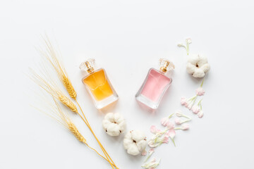 Fototapeta na wymiar Perfume bottles flat lay. Perfumery cosmetics fragrance set