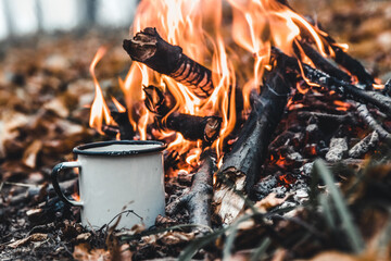 Making coffee at the stake. Make coffee or tea on the fire of nature. Burned fire. A place for fire. - 439825807