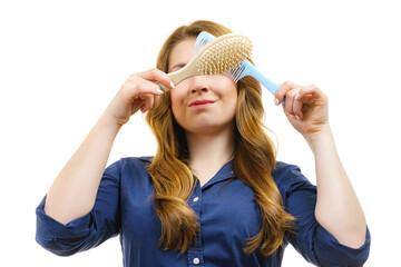 Girl long hair with comb brush