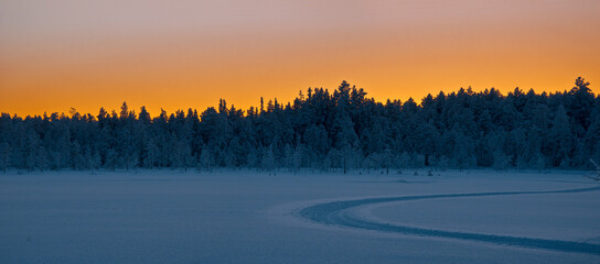 snowmobile tracks in lapland