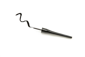 Cosmetic eyeliner with sample strokes isolated on white background
