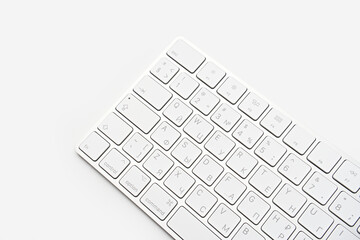 White wireless computer keyboard isolated. Russian-English keyboard layout